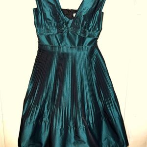 BCBGeneration Party Dress. New Without Tag. Short, jewel-tone green, satin look